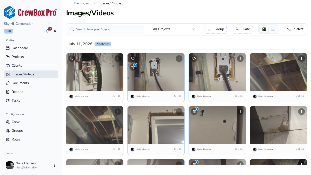 Job-site photos across projects in the CrewBox web console
