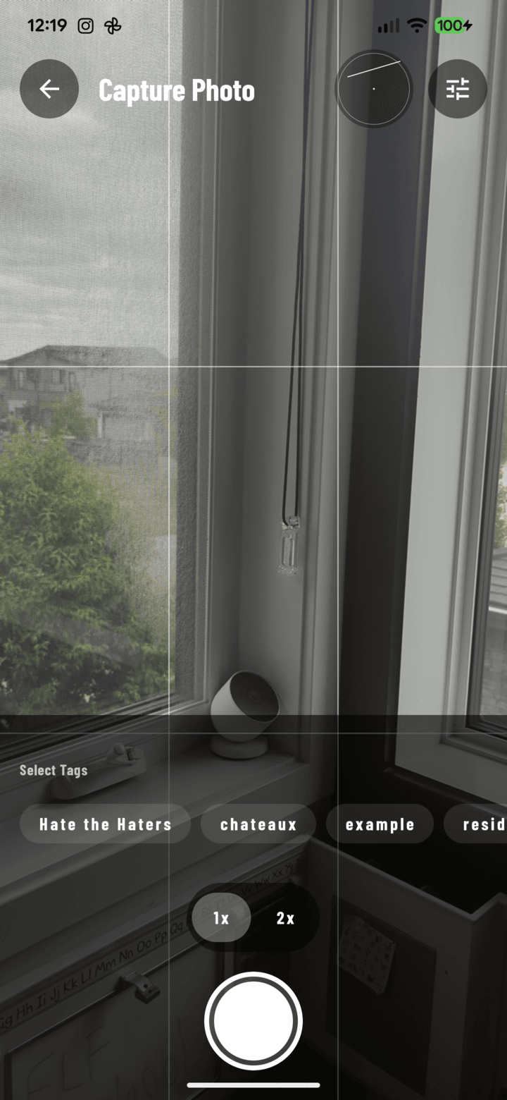 Live camera preview with the rule-of-thirds grid overlay active