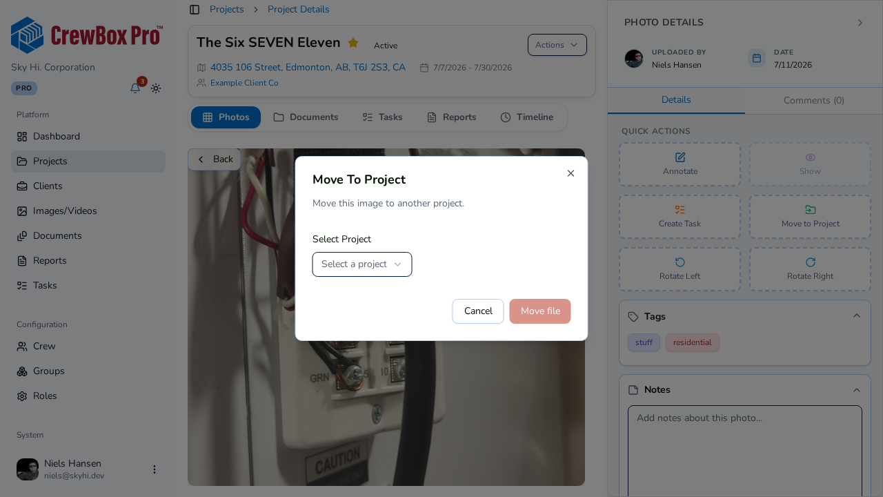 The Move To Project dialog reassigns a photo to another job.