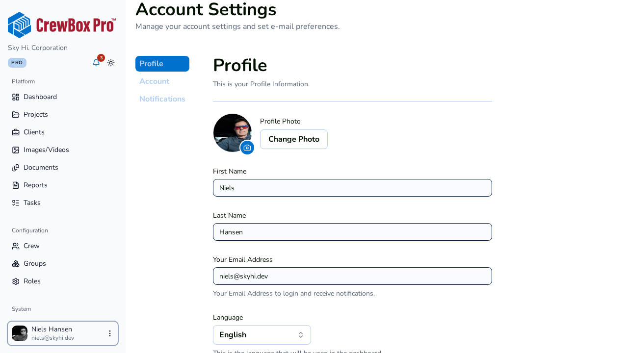 The Profile settings: photo, name, email, and language.